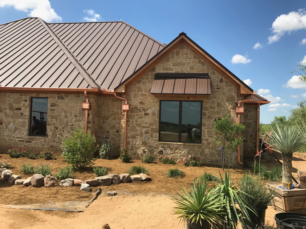 Copper rain gutters installed in a home in the DFW metroplex